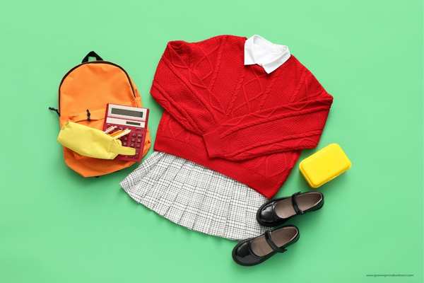 Neatly-wrapped-school-outfit-with-shoe-socks-backpack-beside-it-in-back-to-school-orgaanization-hacks-for-moms..