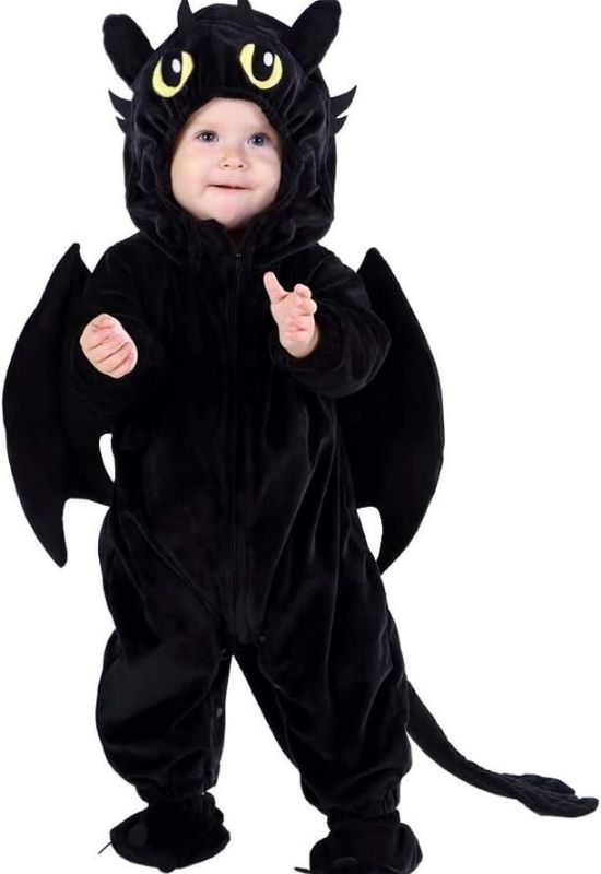 Baby-dressed-in-dragon-costume