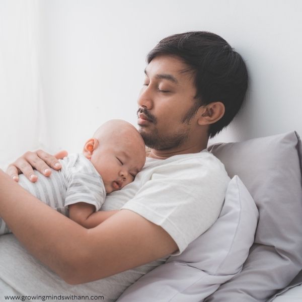 Baby-resting-on-dad's-chest.