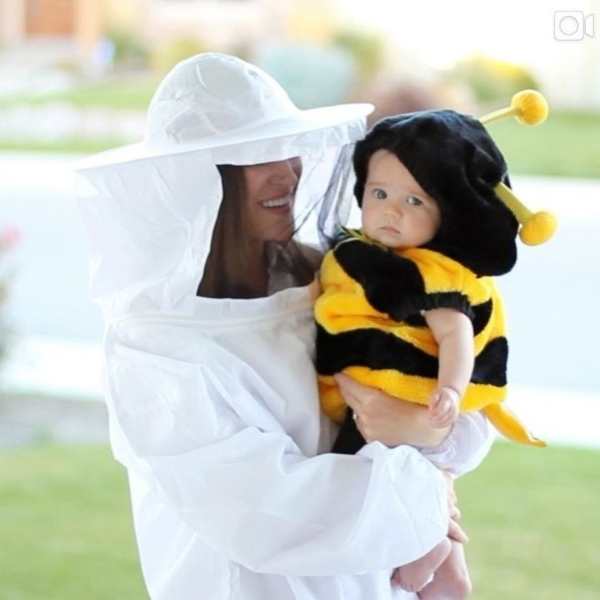 Mom-and-her-baby-dressed-in-bee-and-caterpillar-costume-in-cute-halloween-costume-ideas-for-mom-and-baby.