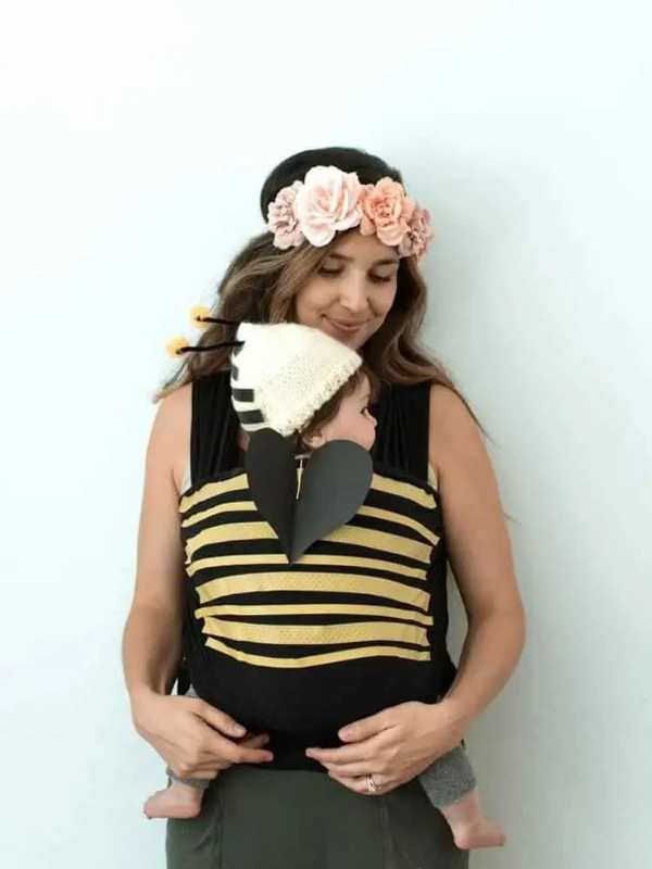 Mom-carrying-her-baby-in-bumblebee-costume-in-baby-carrier-costume-ideas-for babywaering-this-halloween.