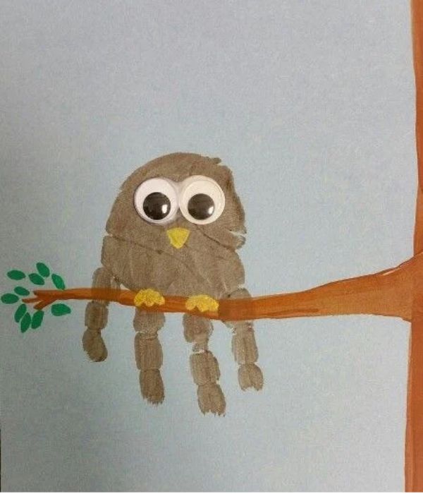 Handprint-owl-on-a-painted-tree.