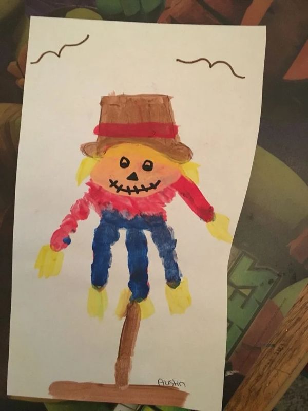 Handprint-scarecrow-fall-handprint-crafts-for-toddlers-and-preschoolers.