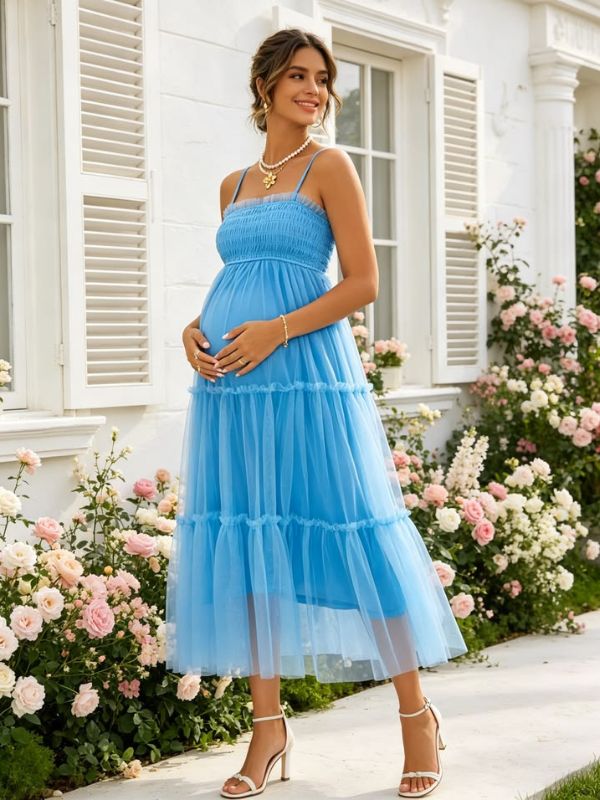 Woman-wearing-blue-tiered-tulle-gown.