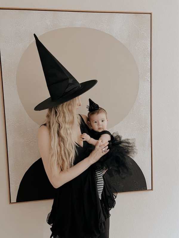 Mom-and-babby-dressed-in-witch-costume.