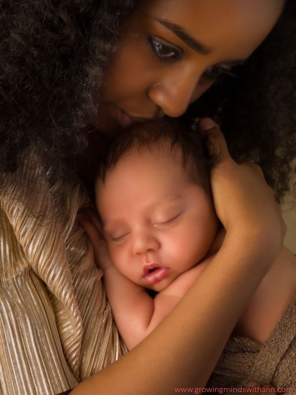 Mom-cuddling-baby-on-her-chest.