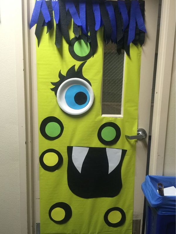 Monster-door-decorations-with-yellow-and-blue-colors-in-Halloween-classroom-decoration-ideas.
