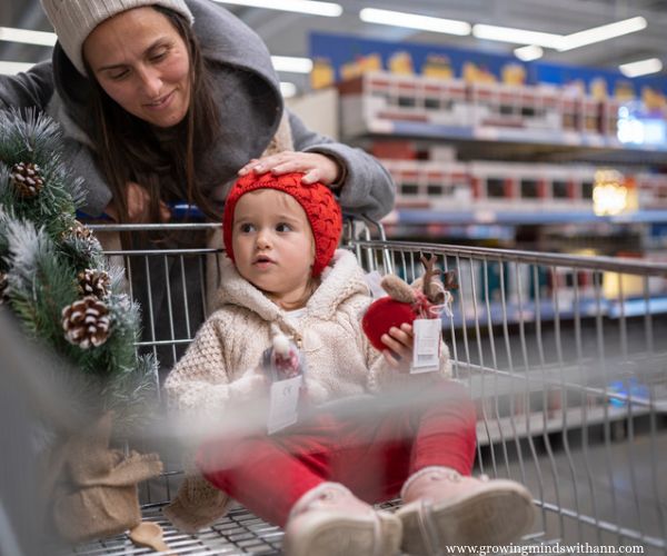 Mom-and-baby-shopping-for-Christmas-in-Christmas-traditions-to-start-with-your-baby.