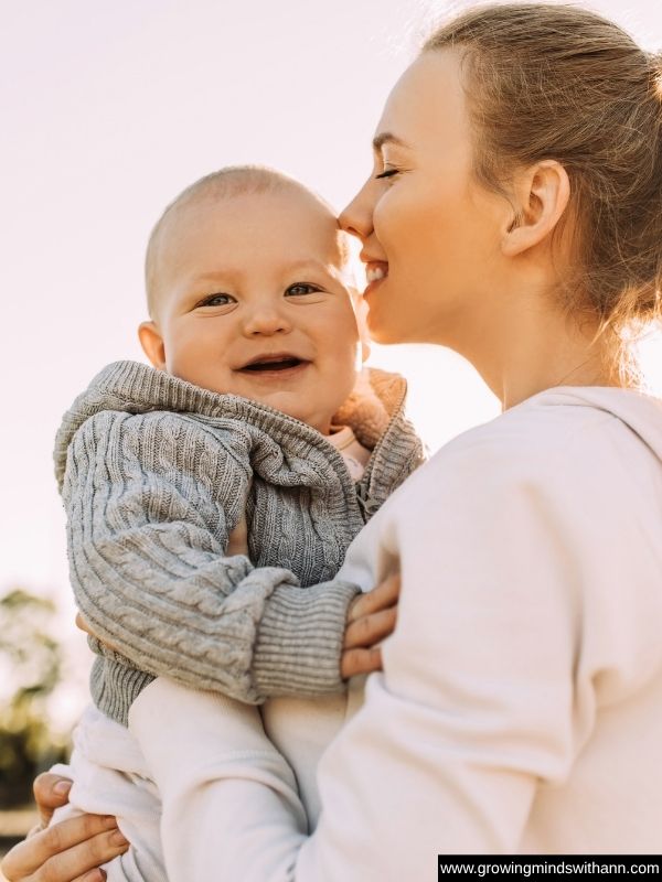 Mom-carrying-baby-in-simple-activities-you-can-do-with-your-baby-at-home.