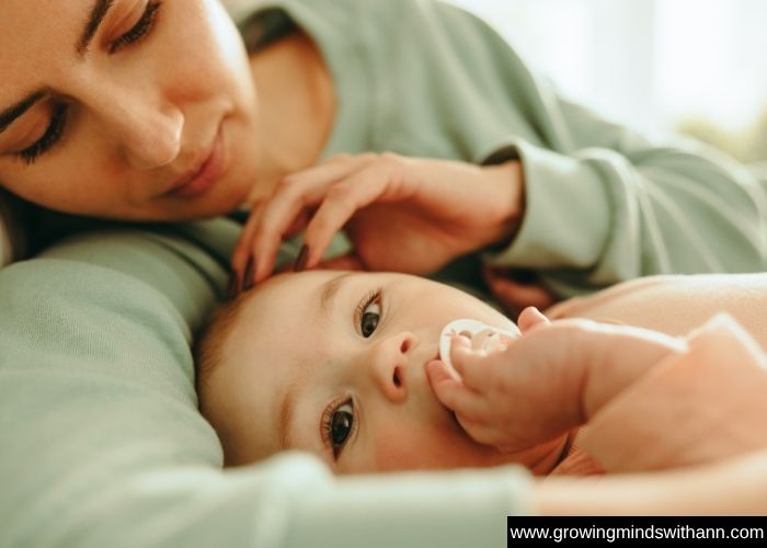 Mom-cuddling-her-baby-in-simple-activities-to-do-with-your-baby-at-home.