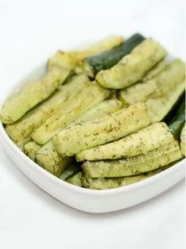 Steamed-Zucchini-in-a-white-plate.