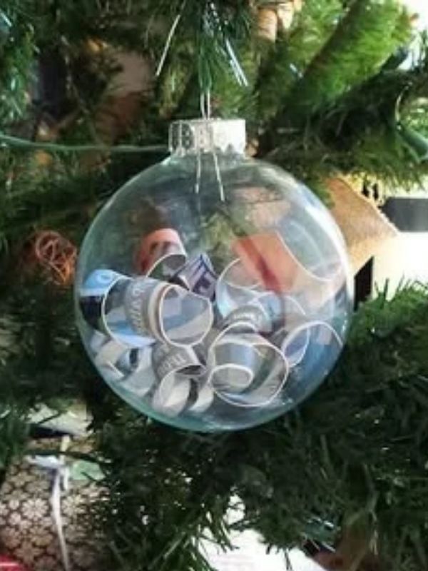 Baby-ornament-hanged-on-a-christmas-tree-in-christmas-traditions-to-start-with-your-baby.