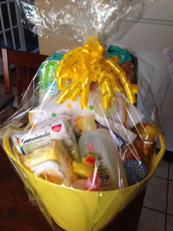 Yellow-basket-containing-baby-wash-baby-cream-diaper-towel-and-other-baby-bath-time-essentials.