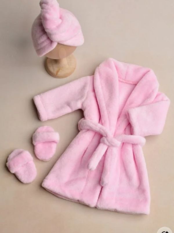 Pink-baby-bathrobe-in-bathtub-baby-shower-gift-ideas-for-new-moms.