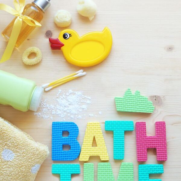 Baby-bath-themometer-and-other-bath-time-essentials-in-bathtub-baby-shower-gift-ideas-for-expectant-moms.
